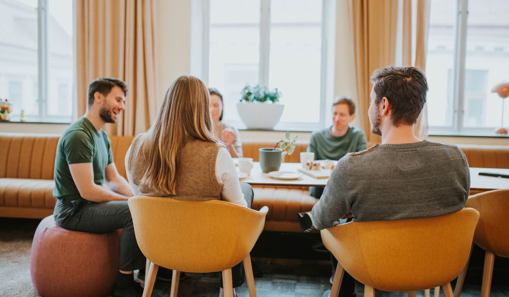 Team sitting together at the table